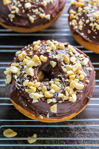 Baked Fluffy Cake Donuts With Chocolate Glaze and Chopped Peanuts