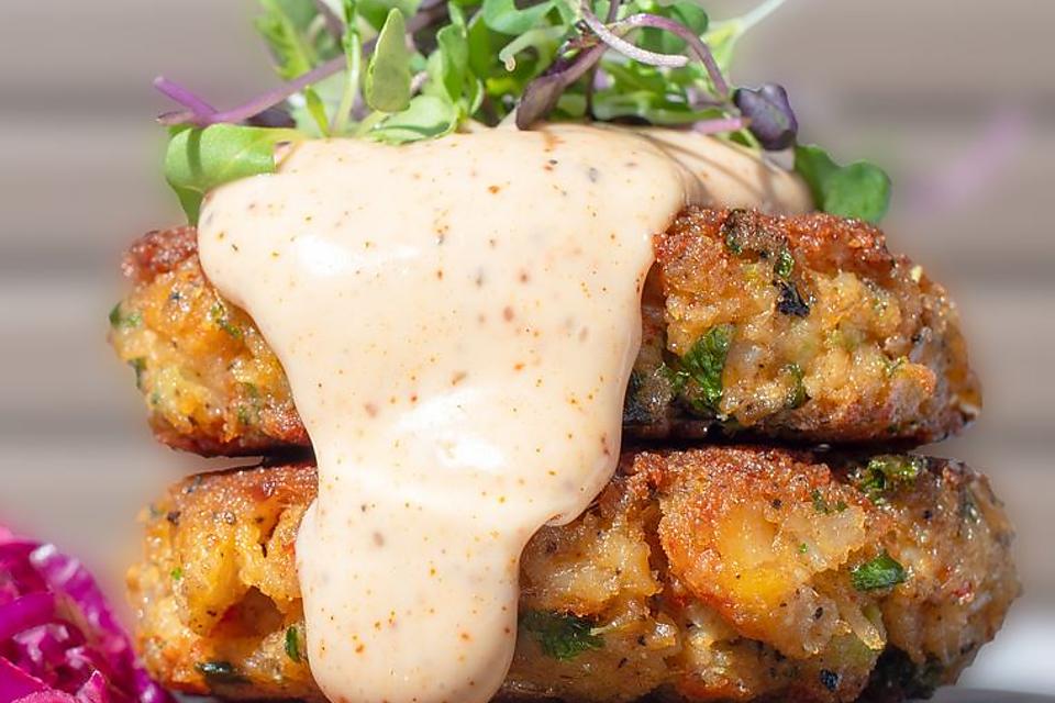 Crab Cake, Seafood, And Vegetable Sauce